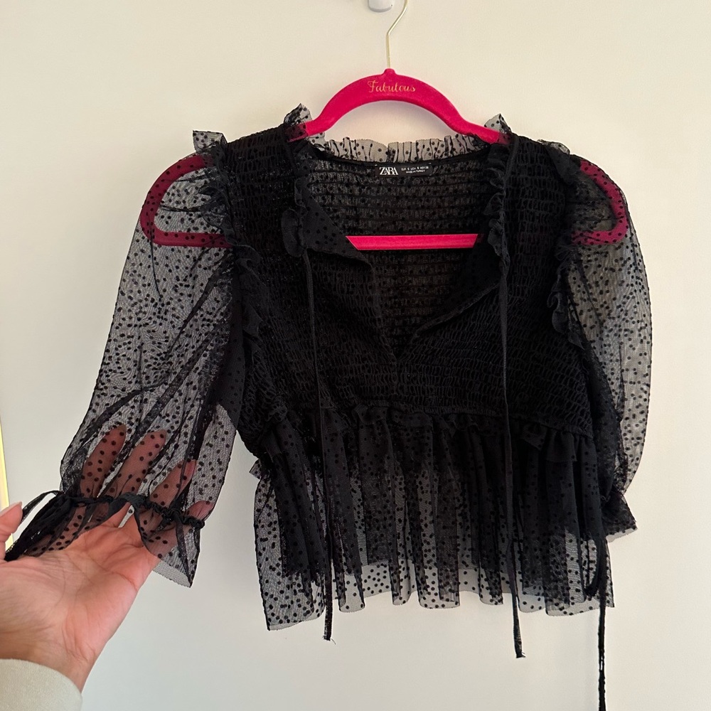 Black mesh peplum top